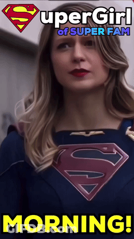 Woman In Supergirl Costume Saying Morning GIF