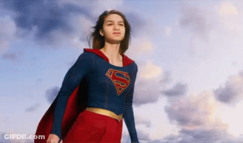 Woman In Superman Costume And Cape GIF