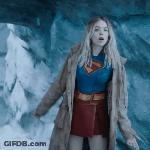 Woman In Superman Costume At Cave GIF