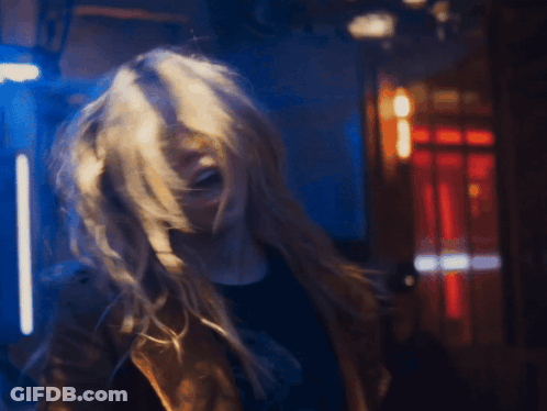 Woman In Superman Costume Smiling GIF