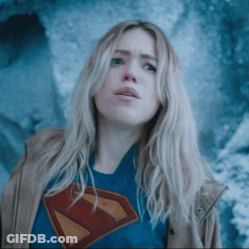 Woman In Superman T-Shirt Looking Up GIF