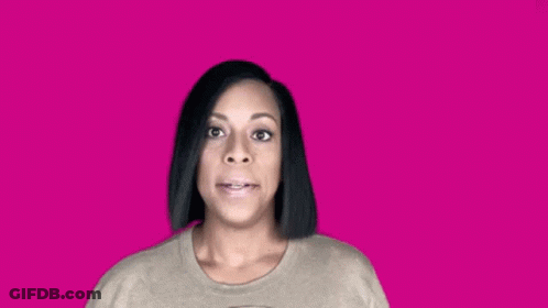 Woman In Sweater Making Funny Face On Pink GIF