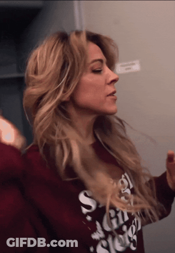 Woman In Sweater Saying S G GIF