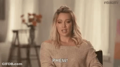 Woman In Sweater Talking GIF