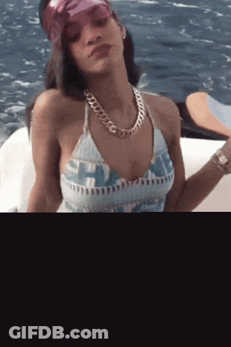 Woman In Swimsuit Sitting On Boat GIF