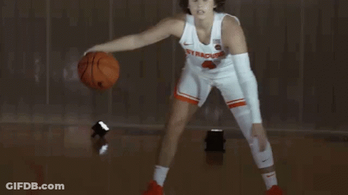 Woman In Syracuse Jersey Holding Basketball GIF