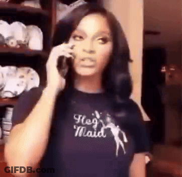 Woman In T-Shirt Saying He's Maid On Phone GIF