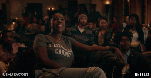 Woman In T-Shirt Saying I Literally Cannot Sits In Crowd GIF