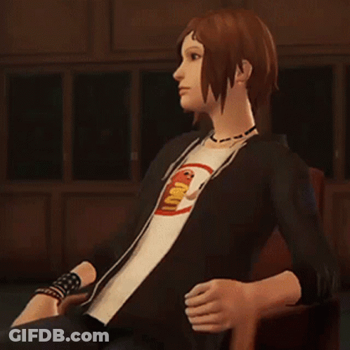 Woman In T-Shirt Saying IU Sitting In Chair GIF