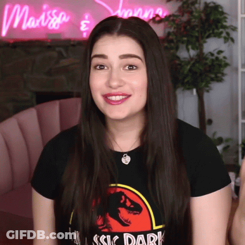Woman In T-Shirt Saying Rassic Dark GIF