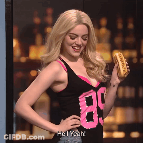 Woman In Tank Top 89 Holding Hot Dog GIF