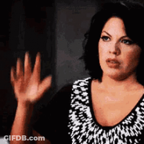 Woman In Tank Top Arms Crossed GIF