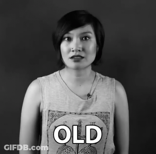 Woman In Tank Top Saying Old GIF
