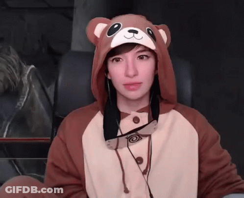 Woman In Teddy Bear Hooded Jacket And Hat GIF