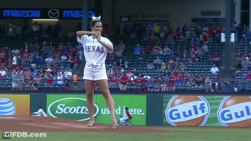 Woman In Texas Shirt Throws Baseball GIF