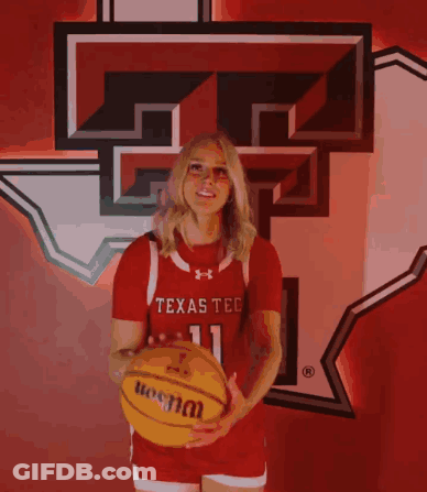 Woman In Texas Tech Jersey With Logo GIF