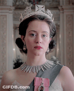 Woman In Tiara And Necklace With Pink Sash GIF
