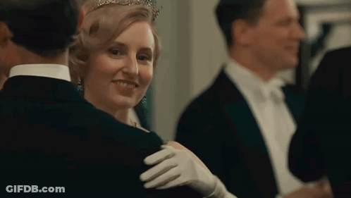 Woman In Tiara Dancing With Man In Tuxedo GIF
