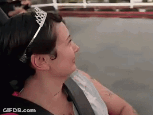 Woman In Tiara On Roller Coaster GIF
