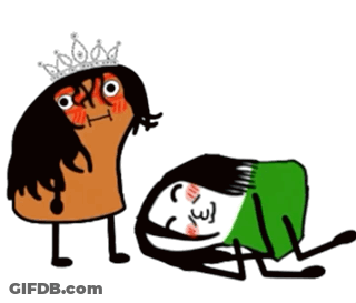 Woman In Tiara Standing Next To Woman Laying On Ground GIF