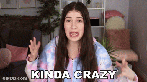 Woman In Tie Dye Sweatshirt Making Funny Face GIF