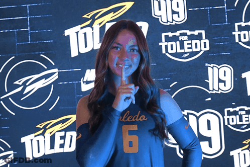 Woman In Toledo Jersey Holding Finger To Mouth GIF