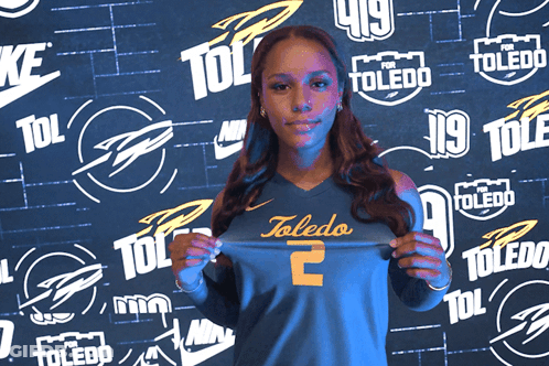 Woman In Toledo Jersey Holding Up Shirt GIF