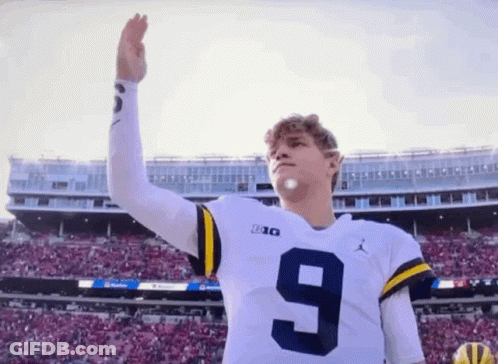 Woman In Toledo Jersey Holding Volleyball GIF