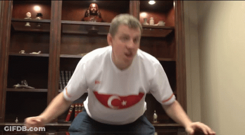 Woman In Toledo Jersey In Front Of Wall GIF