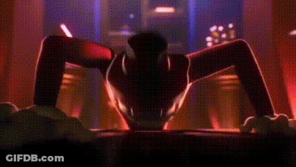Woman In Top Hat Dancing In Dark Room With Crowd GIF