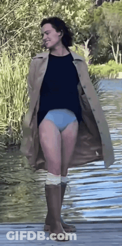Woman In Trench Coat And Blue Underwear GIF