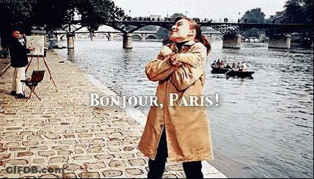 Woman In Trench Coat By River Bonjour Paris GIF