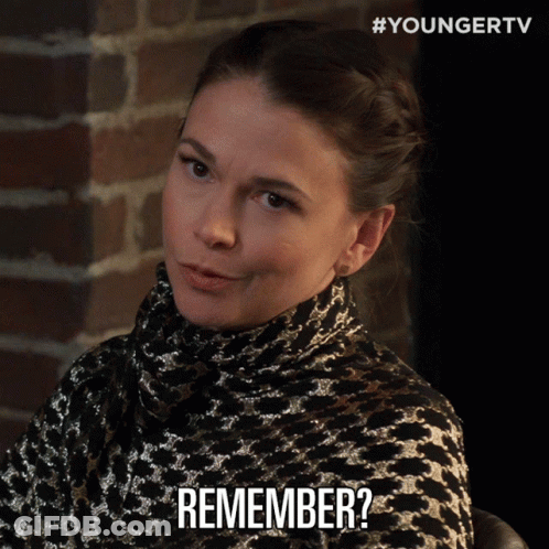 Woman In Turtleneck Saying Remember GIF