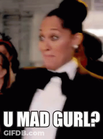 Woman In Tuxedo Asking If She Is Mad GIF