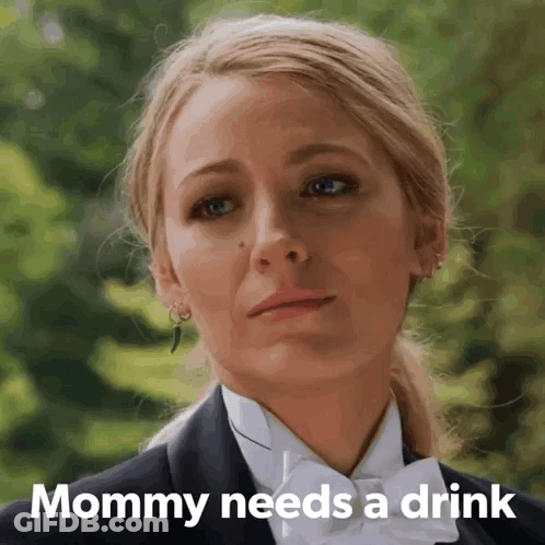 Woman In Tuxedo Mommy Needs A Drink GIF