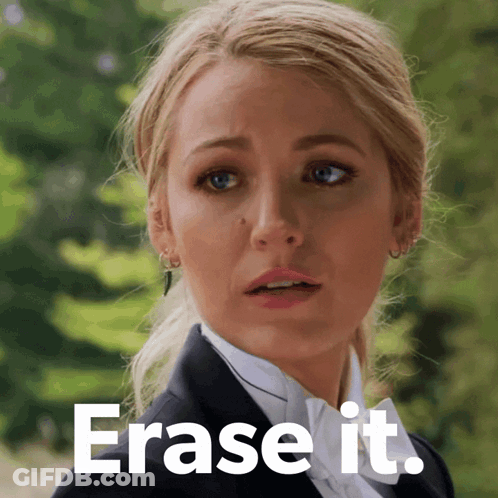 Woman In Tuxedo Saying Erase It GIF