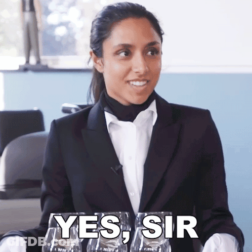 Woman In Tuxedo Saying Yes Sir GIF