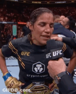 Woman In UFC Shirt Being Interviewed GIF