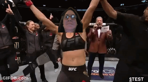 Woman In UFC Top Raising Hands GIF