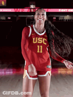 Woman In USC Jersey Dancing On Basketball Court GIF