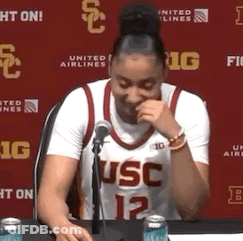 Woman In USC Jersey Sitting At Table With Microphone GIF
