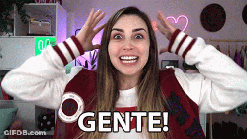 Woman In Varsity Jacket Making Funny Face Saying Gente GIF