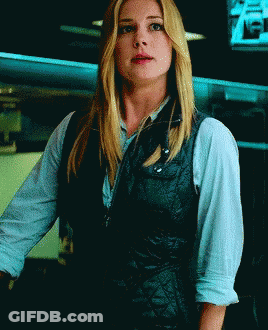 Woman In Vest And Blue Shirt GIF