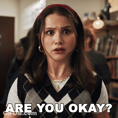 Woman In Vest And Headband Says Are You Okay GIF