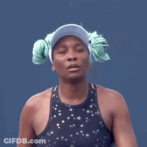 Woman In Visor And Star Tank Top With Rope In Hair GIF