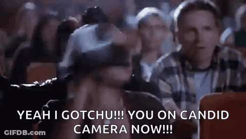 Woman In VR Headset Sitting In Movie Theater GIF