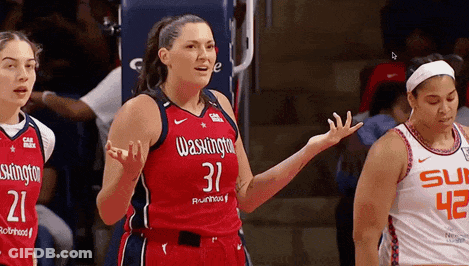 Woman In Washington Wizards Jersey Talking To Another Woman GIF