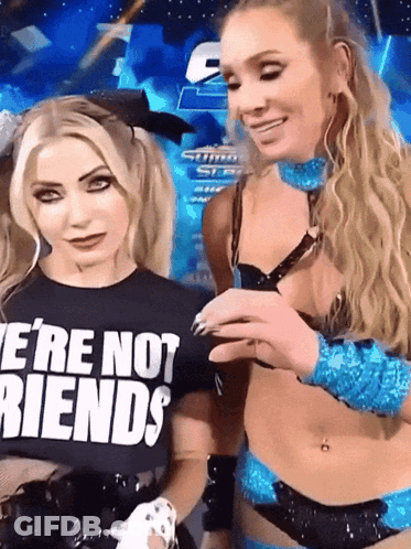Woman In We're Not Friends Shirt Next To Another Woman GIF