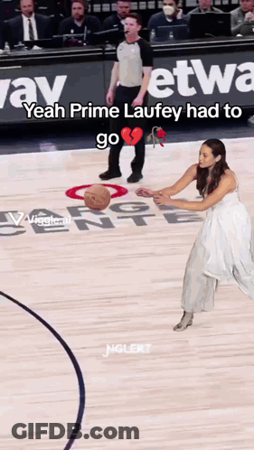 Woman In Wedding Dress Holding Basketball On Court GIF