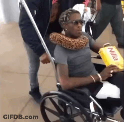 Woman In Wheelchair Holding Box Of Nilla GIF